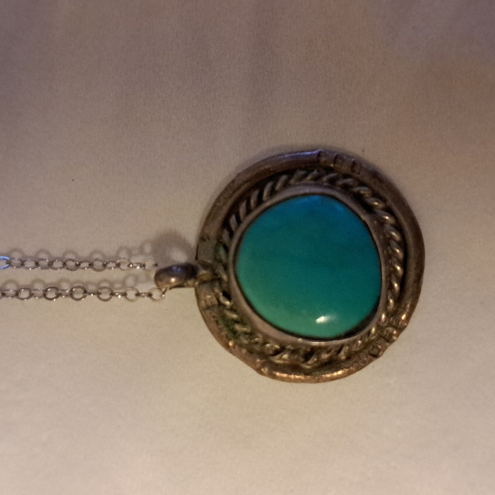 Turquoise pendent with chain.